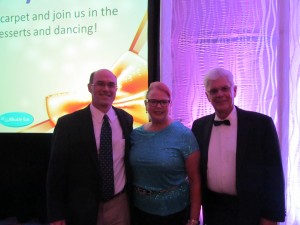 Hearing Review Editor Karl Strom with Patricia Connelly, PhD, and Thomas Higgins, ACA, BC-HIS, who are husband and wife. Higgins received this year's Hearing Review Professional Leadership Award for his leadership of IHS during the past year as president.
